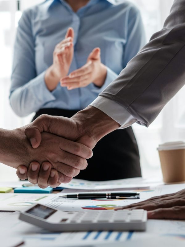 Handshake of business People deal business. Hold hand and shaking hand in office.